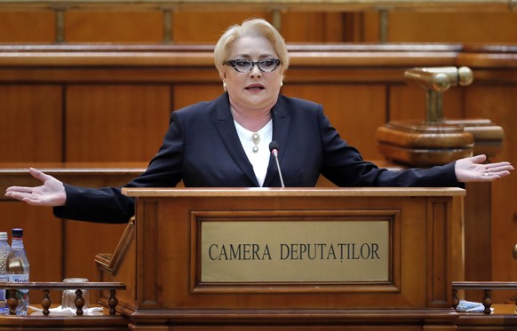 epa07242139 Romania&#039;s Prime Minister Viorica Dancila gestures while addressing the lawmakers of both parliament chambers, defending her cabinet policies, as she faces a no-confidence vote, at Par ...