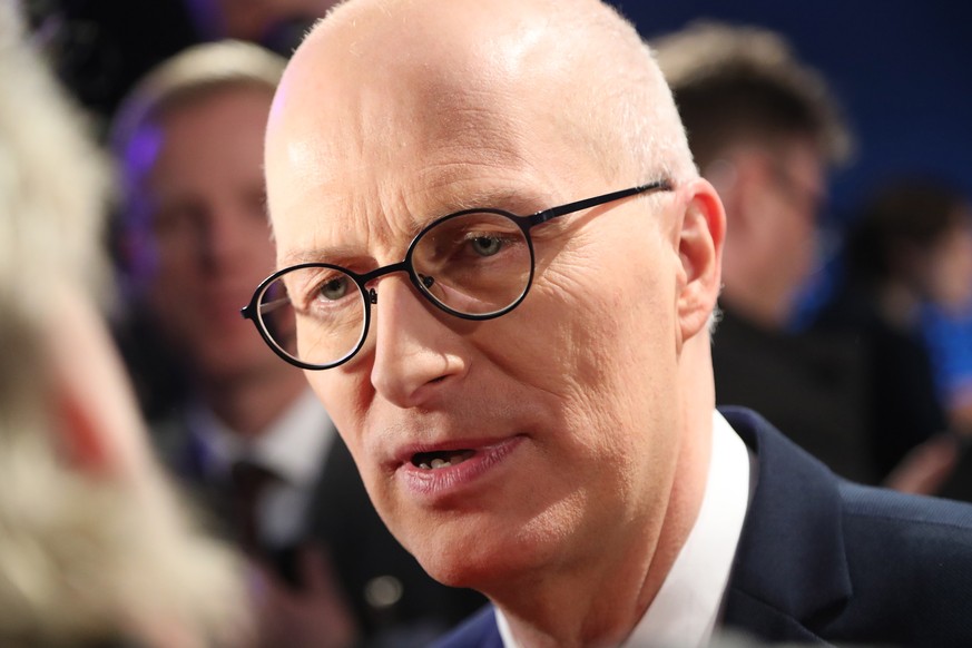 epa08242135 The leading candidate of the Social Democratic Party SPD, Peter Tschentscher, at a TV studio after the regional elections in the German federal state of Hamburg in Hamburg, Germany, 23 Feb ...