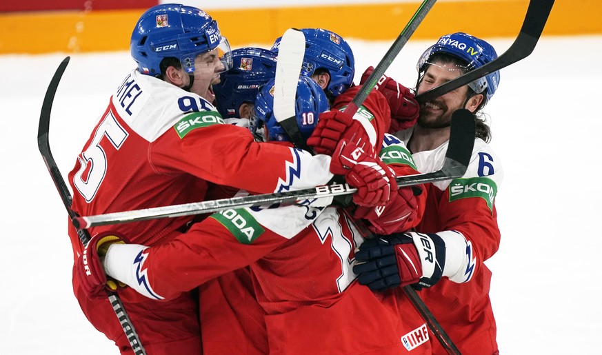 Czech Republic teammates celebrate a goal by Roman Cervenka of the Czech Republic during the Hockey World Championship bronze medal match between Czech Republic and USA in Tampere, Finland, on Sunday, ...