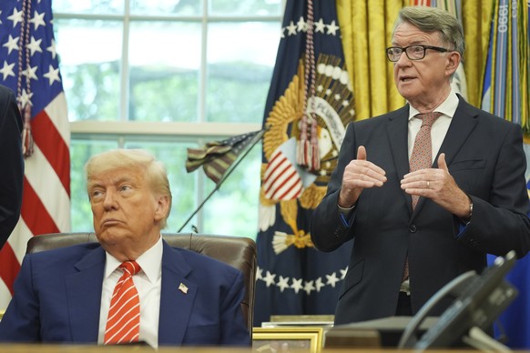 President Donald Trump, listening to Britian's ambassador to the Peter Mandelson, right, delivering remarks on a trade deal between U.S. and U.K. in the Oval Office of the White House, Thursday,  ...