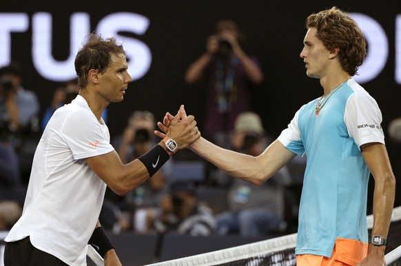Spain&#039;s Rafael Nadal, left, is congratulated by Germany&#039;s Alexander Zverev after winning their third round match at the Australian Open tennis championships in Melbourne, Australia, Saturday ...