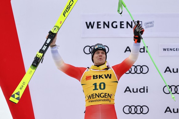 Second placed Stefan Rogentin of Switzerland celebrates on the podium after the men&#039;s Super G race at the Alpine Skiing FIS Ski World Cup in Wengen, Switzerland, Friday, January 13, 2023. (KEYSTO ...