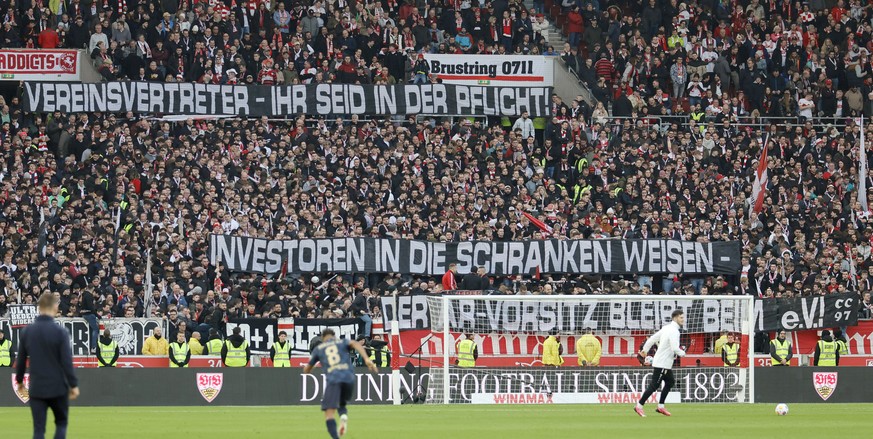 epa11145341 Stuttgart fans hold banners during a protest against the DFL during the German Bundesliga soccer match between VfB Stuttgart and 1. FSV Mainz 05 in Stuttgart, Germany, 11 February 2024. EP ...