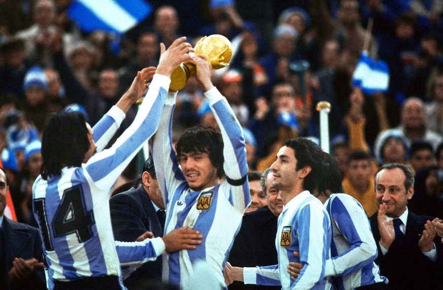Argentina soccer team players celebrate after winning the World Cup in Buenos Aires, Argentina, on June 25, 1978. Argentina defeated The Netherlands 3-1 after extra time in the World Cup Final to win  ...
