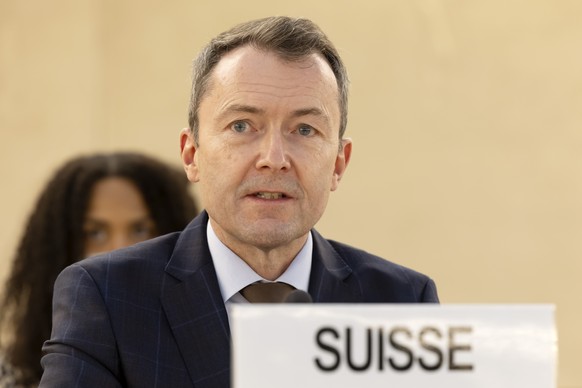 Ambassador Juerg Lauber, 2nd left, Permanent representative of Switzerland to Geneva United Nations, delivers his speech, during a general debat on situation in Ukraine at the 49th session of the Huma ...