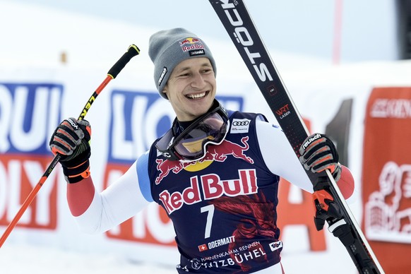 Switzerland&#039;s Marco Odermatt celebrates taking second place in an alpine ski, men&#039;s World Cup downhill, in Kitzbuehel, Austria, Sunday, Jan. 23, 2022. (AP Photo/Giovanni Auletta)