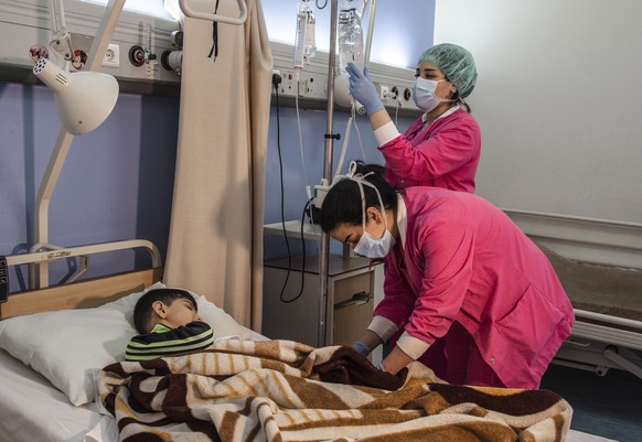 epa08417445 Nurses at their work during International Nurses Day at Beirut Governmental Hospital, in Beirut Lebanon, 12 May 2020. International Nurses Day is marked annually to commemorate the birth a ...