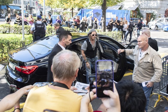 American actor Johnny Depp arrives at the 14th Zurich Film Festival (ZFF) in Zurich, Switzerland, Friday, Oct. 5, 2018. The festival runs from 27 September to 07 October. (Ennio Leanza/Keystone via AP ...