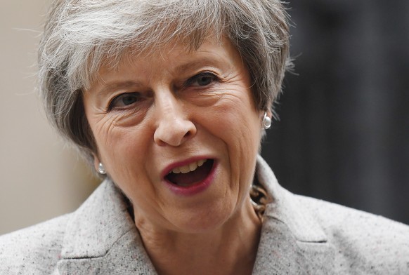 epa07182801 British Prime Minister Theresa May delivering a statement to the press outside 10 Downing Street in London, Britain, 22 November 2018. Prime Minister Theresa May has held an emergency Brex ...