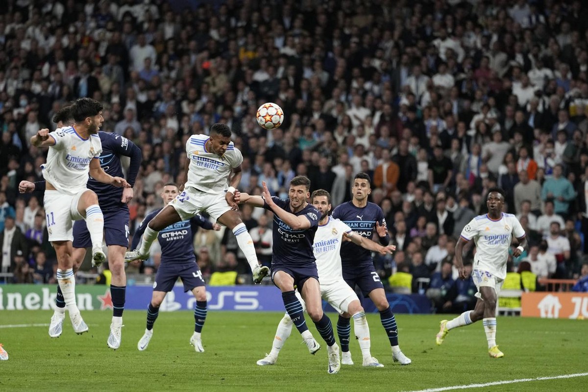 Real Madrid's Rodrygo scores his side's second goal during the Champions League semi final, second leg, soccer match between Real Madrid and Manchester City at the Santiago Bernabeu stadium  ...