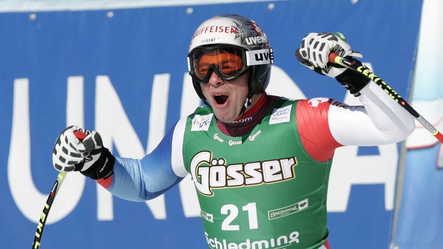 IMAGO / Camera 4/PhotoSI

Beat Feuz of Switzerland reacts in finish of men downhill race of Audi FIS Alpine skiing World cup finals in Schladming, Austria. Men downhill race of Audi FIS Alpine skiing  ...