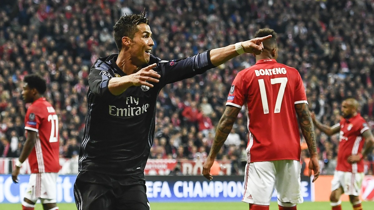 epa05905143 Real Madrid's Cristiano Ronaldo celebrates after scoring the 2-1 lead during the UEFA Champions League quarter final, first leg soccer match between FC Bayern Munich and Real Madrid a ...