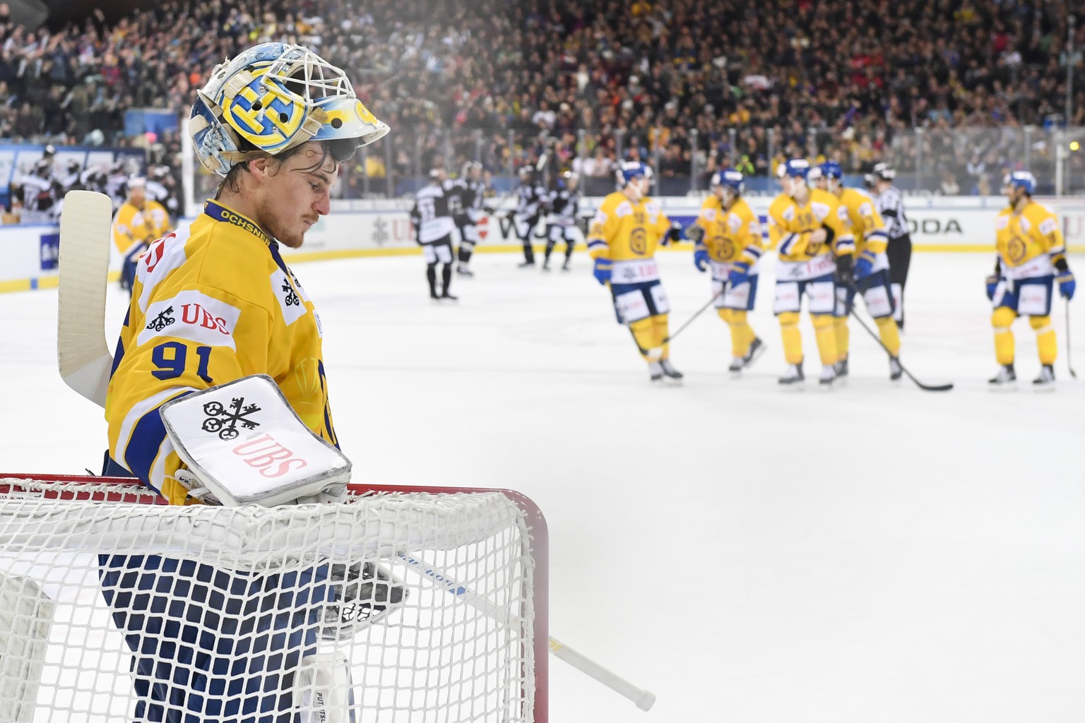 Davos&#039;goalkeeper Gilles Senn looks on after the game between Thomas Sabo Ice Tigers and HC Davos, at the 92th Spengler Cup ice hockey tournament in Davos, Switzerland, Thursday, December 27, 2018 ...