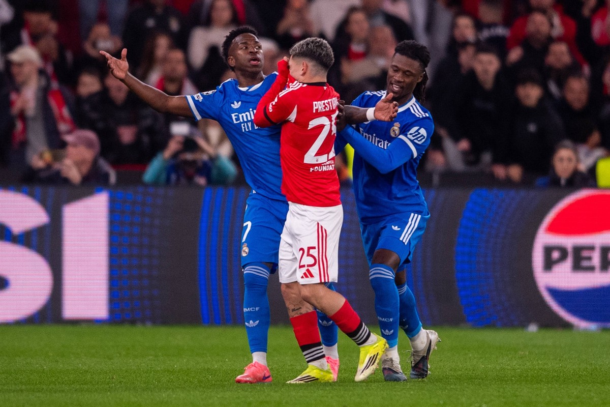 February 17, 2026, Lisbon, Lisboa, Portugal: Gianluca Prestianni of SL Benfica seems with Vinicius Junior of Real Madrid CF during the UEFA Champions League 2025/26 League Knockout Play-off First Leg  ...