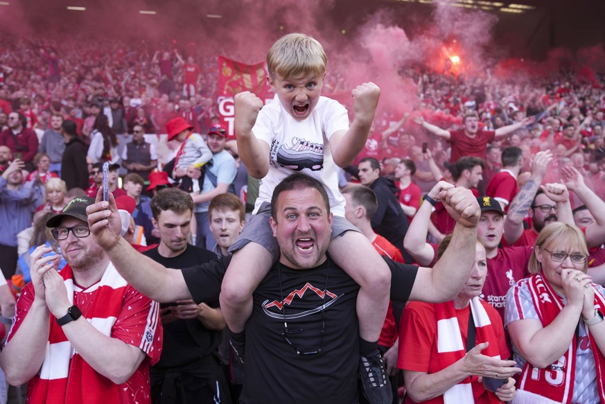 Liverpool soccer fans celebrate their team&#039;s victory against Tottenham Hotspur, clinching the Premier League title at Anfield in Liverpool, England, April 27, 2025. (AP Photo/Jon Super)
Pictures  ...