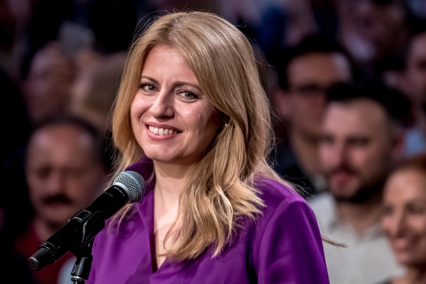epa07474813 Slovak presidential candidate Zuzana Caputova speaks to journalists during an elections night at her election headquartes in the Slovakia&#039;s presidential election run-off in Bratislava ...
