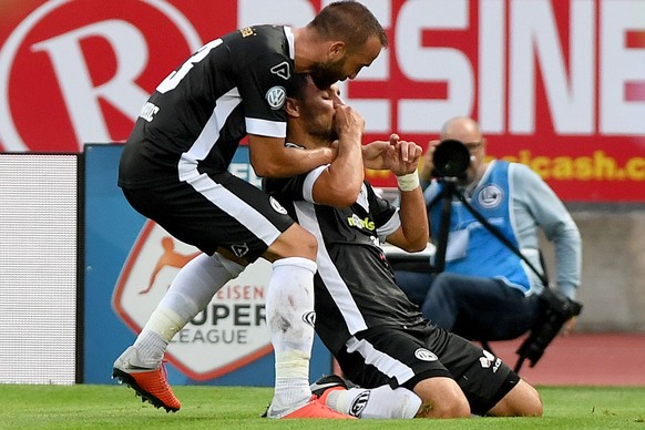 Lugano&#039;s player Miroslav Covilo right celebrate the 1 - 0 goal with Lugano&#039;s player Mijat Maric left, during the Super League soccer match FC Lugano against FC Zuerich, at the Cornaredo stad ...