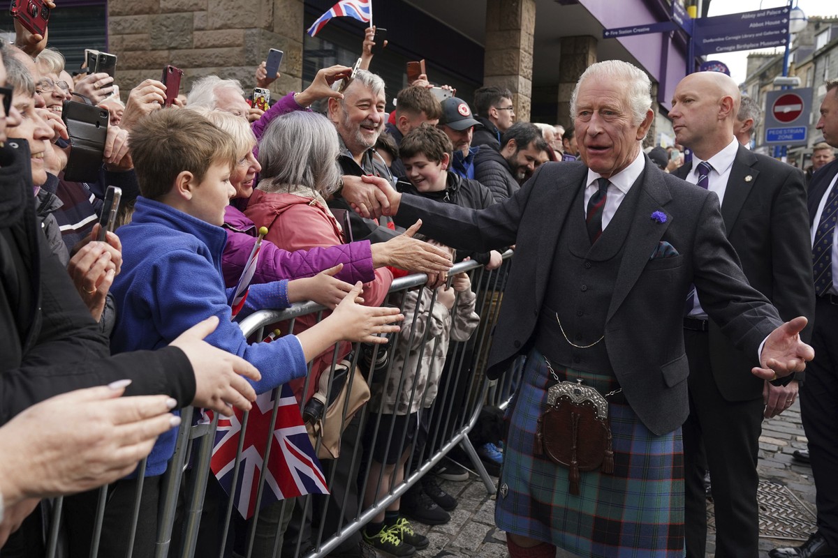 Britain's King Charles III meets the public after attending an official council meeting at the City Chambers in Dunfermline, Fife, to formally mark the conferral of city status on the former town ...