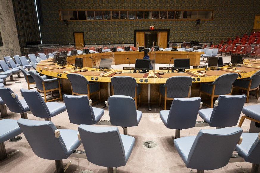 epa10000661 View of the room of the United Nations Security Council, with the seats of the Russian Federation, Norway, and Mexico, center from left, at the UN headquarters in New York, USA, 07 June 20 ...