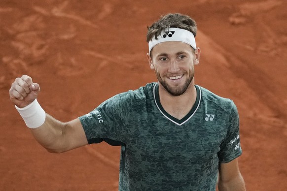 Norway&#039;s Casper Ruud celebrates winning the semifinal match against Croatia&#039;s Marin Cilic in four sets, 3-6, 6-4, 6-2, 6-2, at the French Open tennis tournament in Roland Garros stadium in P ...