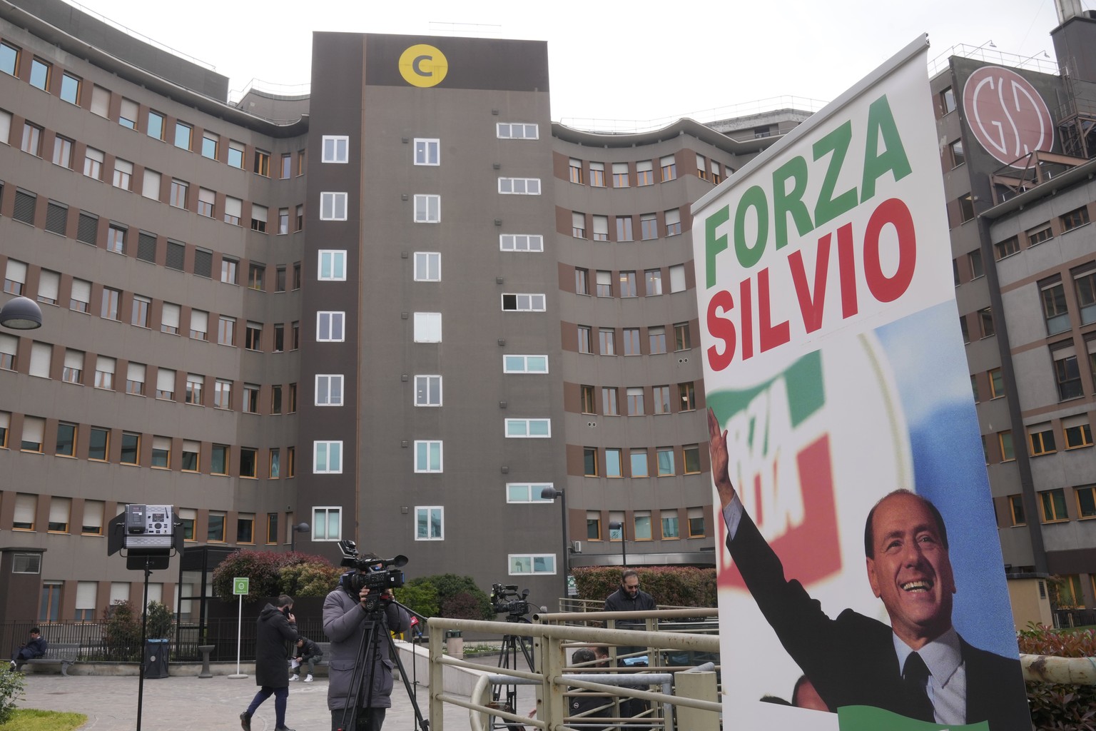 A banner saying &quot;Forza Silvio&quot; (Go Silvio) is seen in front of the San Raffaele hospital, in Milan, Italy, Friday, April 7, 2023. Ex-Premier Silvio Berlusconi was hospitalized Wednesday with ...