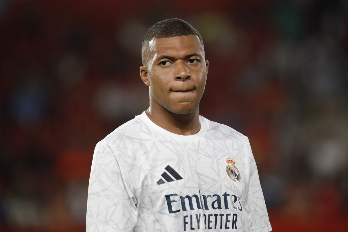FILE - Real Madrid's Kylian Mbappe looks on before the start of a Spanish La Liga soccer match between Mallorca and Real Madrid at the Son Moix Stadium in Palma de Mallorca, Spain, Sunday, Aug. 1 ...