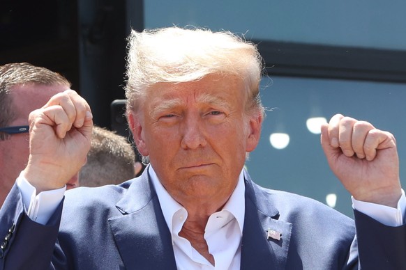 epa10797971 Former US President Donald J. Trump attends the Iowa State Fair in Des Moines, Iowa, USA, 12 August 2023. Trump is campaigning ahead of the 2024 US presidential election. EPA/ALEX WROBLEWS ...
