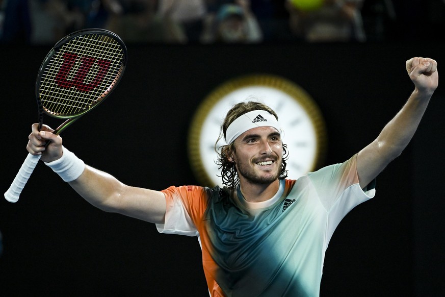 epaselect epa09709834 Stefanos Tsitsipas of Greece celebrates after winning his Men?s quarterfinal match against Jannik Sinner of Italy at the Australian Open Grand Slam tennis tournament at Melbourne ...