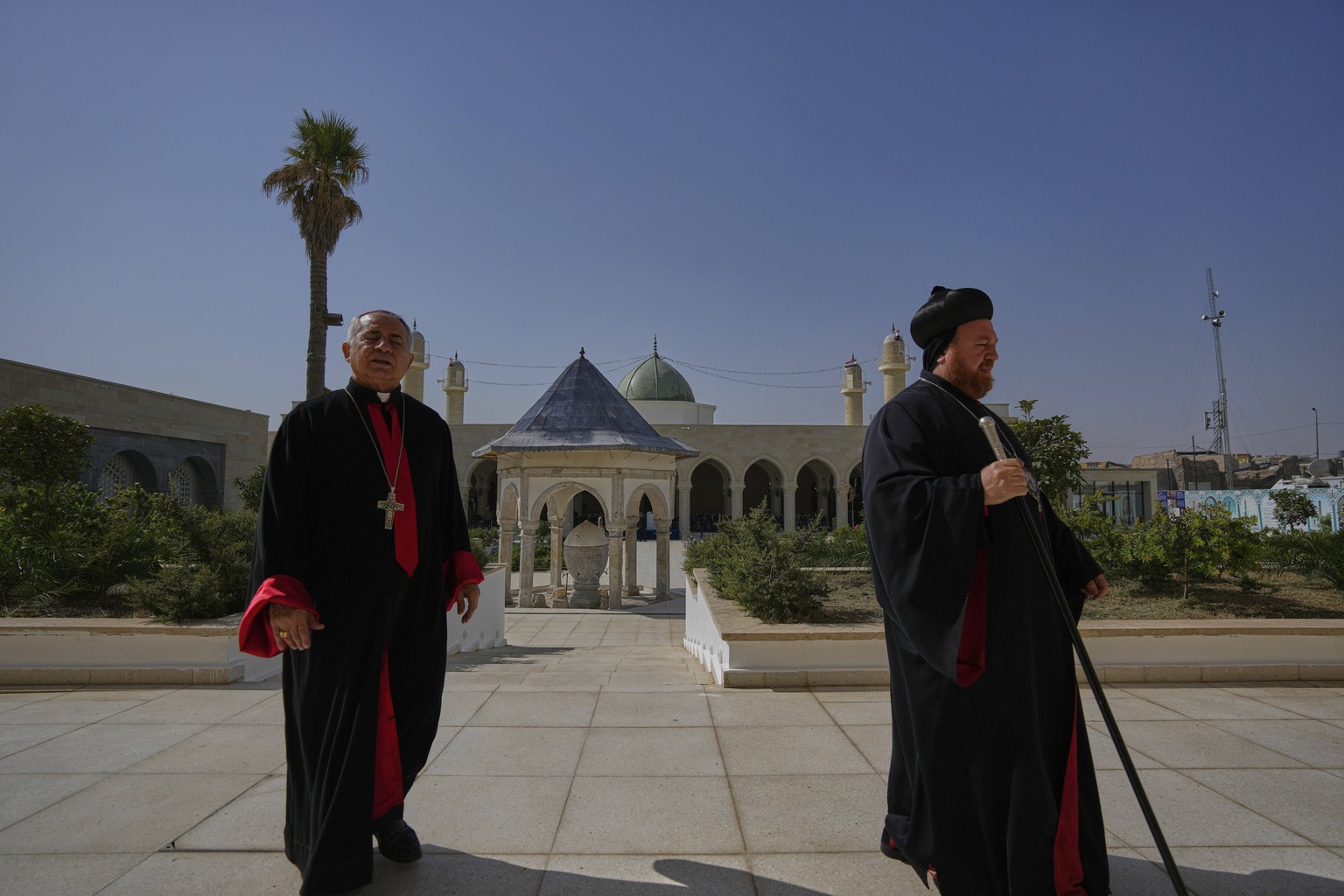 Iraqi Christian priests attend the reopening of the historic Al-Nuri Grand Mosque and its leaning minaret in Mosul&#039;s Old City, Iraq, Monday, Sept. 1, 2025. (AP Photo/Hadi Mizban)
Iraq Mosul Recon ...