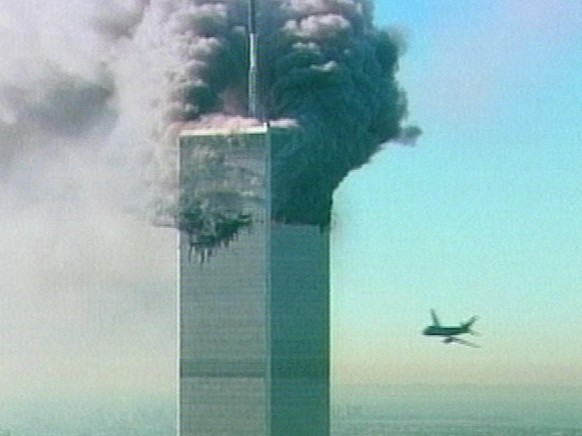 USA SEPT11 ANSCHLAG WORLD TRADE CENTER
An aircraft at right about to fly into the the World Trade Center in New York in this image made from television, Tuesday September 11, 2001. The aircraft was th ...