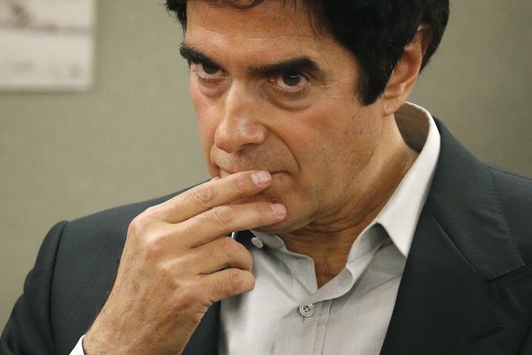 Illusionist David Copperfield appears in court Wednesday, April 18, 2018, in Las Vegas. Copperfield testified in a negligence lawsuit involving a British man who claims he was badly hurt when he fell  ...