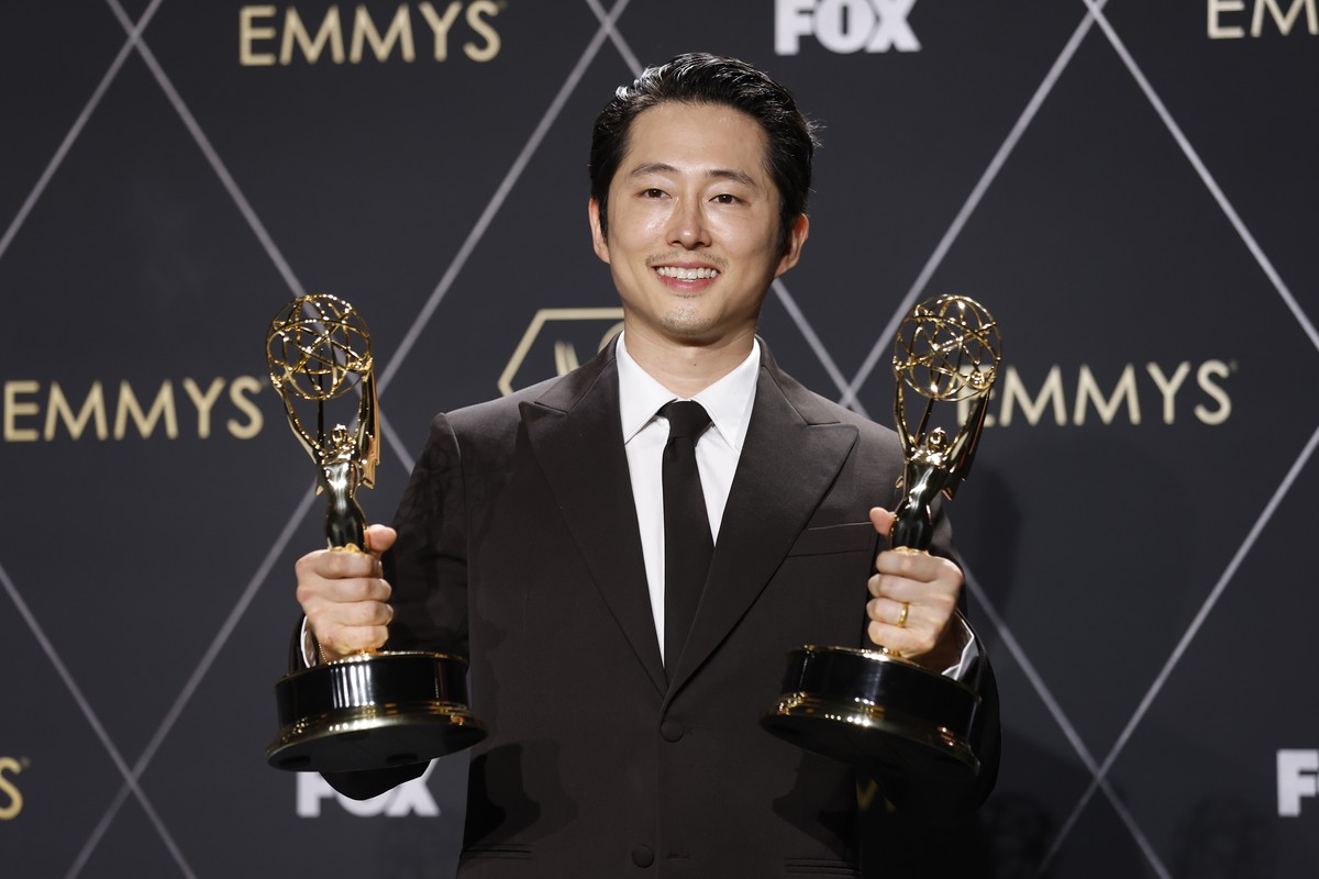 epa11081305 US actor Steven Yeun, winner of Outstanding Lead Actor In A Limited Or Anthology Series Or Movie and Outstanding Limited Or Anthology Series for 'Beef,' poses in the press room d ...