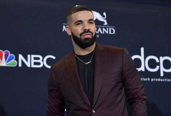 FILE - Drake poses at the Billboard Music Awards in Las Vegas on May 1, 2019. Drake says his new album, ?For All the Dogs,? may drop in a couple of weeks. His announcement came during a tour stop at t ...