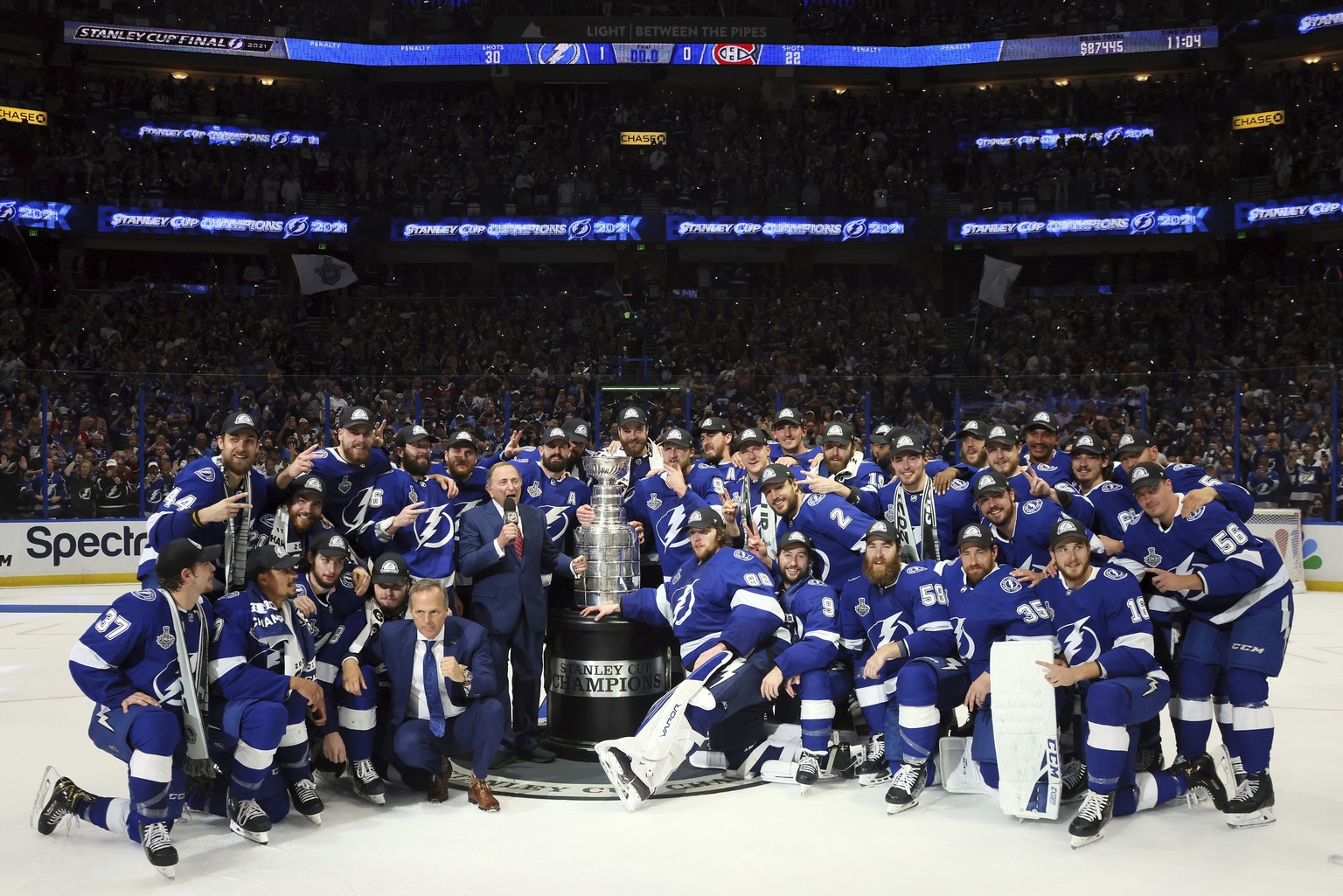 The Tampa Bay Lightning pose with the Stanley Cup after defeating the Montreal Canadiens 1-0 in Game 5 to win the NHL hockey Stanley Cup Finals, Wednesday, July 7, 2021, in Tampa, Fla. (Bruce Bennett/ ...