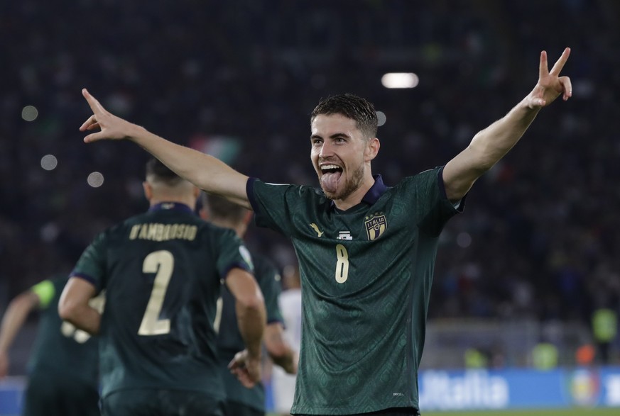 Italy's Jorginho celebrates after he scores the opening goal of the game from the penalty spot during the Euro 2020 group J qualifying soccer match between Italy and Greece in Rome, Italy, Saturday, O ...