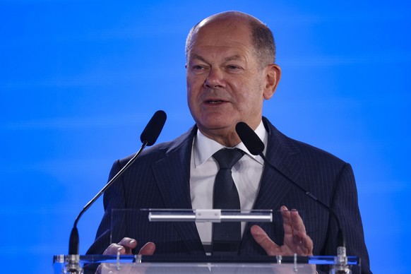 epa11613478 German Chancellor Olaf Scholz speaks as he attends the MoReTec-1 foundation stone-laying ceremony at LyondellBasell&#039;s chemical recycling plant in Wesseling-Knapsack, Germany, 19 Septe ...