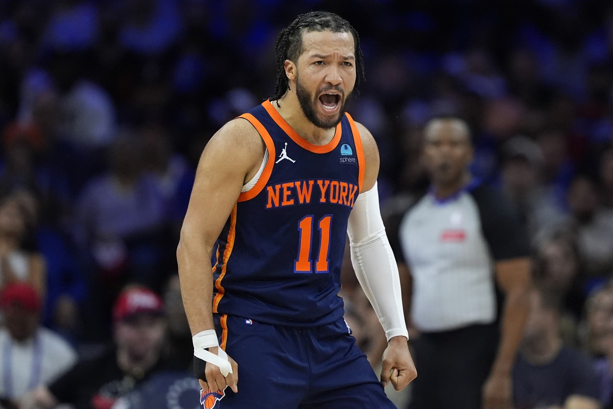 New York Knicks' Jalen Brunson reacts during the first half of Game 4 in an NBA basketball first-round playoff series against the Philadelphia 76ers, Sunday, April 28, 2024, in Philadelphia. (AP  ...