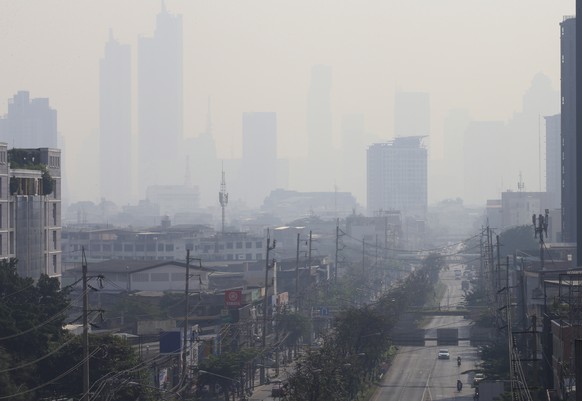 epa10442112 Heavy air pollution from particulate matter (PM2.5) envelops the air over Bangkok, Thailand, February 1, 2023. Authorities warned that the harmful PM2.5 dust air pollution on 01...