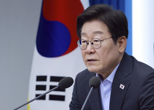 South Korean President Lee Jae Myung attends a Cabinet Council meeting at the presidential office in South Korea, Thursday, July 24, 2025. (Yonhap via AP)
South Korea Migrant Workers