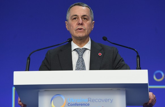 epa10705793 Foreign Minister of Switzerland Ignazio Cassis addresses the closing session on the second and final day of the Ukraine Recovery Conference (URC) in London, UK June 22, 2023…