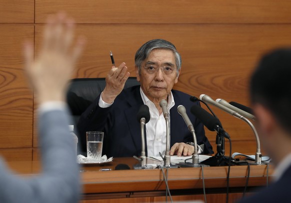 epa06809123 Haruhiko Kuroda, the Governor of the Bank of Japan (BOJ), speaks during a news conference following a two-day monetary policy meeting in Tokyo, 15 June 2018. BOJ decided the bank will appl ...