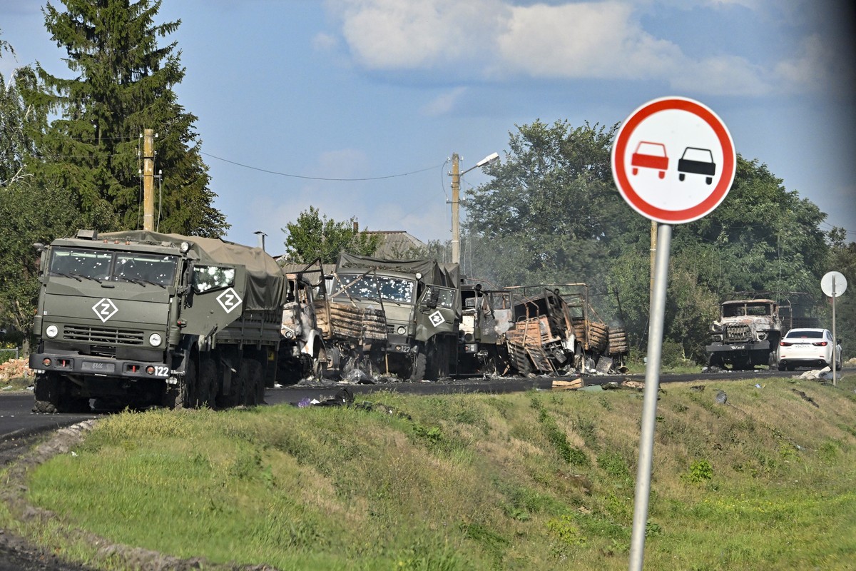 A view of the column of Russian Army trucks damaged by shelling by the Ukrainian Armed Forces on the highway in the Sudzhansky district, Kursk region of Russia, Friday, Aug. 9, 2024. (Anatoliy Zhdanov ...