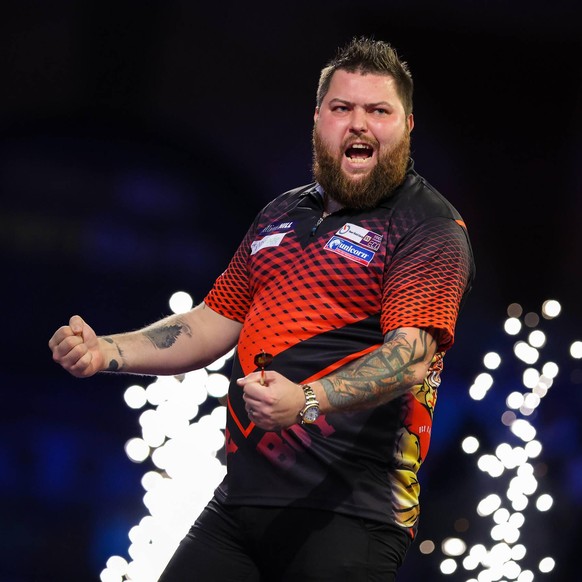 IMAGO / Pro Sports Images

PDC World Darts Championship 2022 Michael Smith celebrates winning the match against Gerwyn Price during the PDC World Darts Championship 2022, at Alexandra Palace, London,  ...