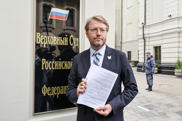 RUSSIA, MOSCOW - AUGUST 14, 2026: Yabloko Party Chairman Nikolai Rybakov arrives at the building of the Supreme Court of Russia to file an appeal against the court s ruling which deregistered the part ...
