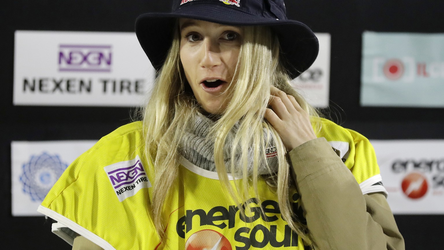 Austria&#039;s Anna Gasser smiles on the podium after winning the women&#039;s World Cup snowboard race in Rho, near Milan, Italy, Saturday, Nov. 12, 2016. (AP Photo/Antonio Calanni)