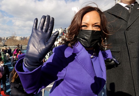 epa08953142 US Vice President Kamala Harris waves as she leaves during the inauguration of Joe Biden as the 46th President of the United States on the West Front of the U.S. Capitol in Washington, DC, ...