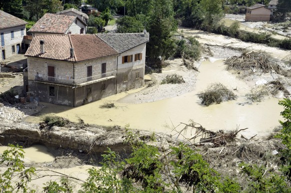 epa10188143 Aftermath of flash floods caused by an overnight rain bomb, in Senigallia, Ancona province, central Italy, 16 September 2022. At least 10 people died following flash floods and heavy winds ...