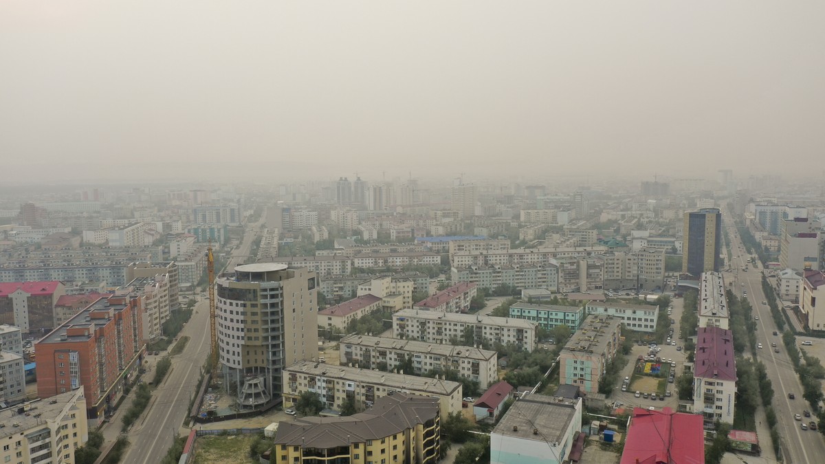 Smoke form a forest fire covers Yakustk, the capital of the republic of Sakha also known as Yakutia, Russia Far East, Monday, July 19, 2021. Russia has been plagued by widespread forest fires, blamed  ...