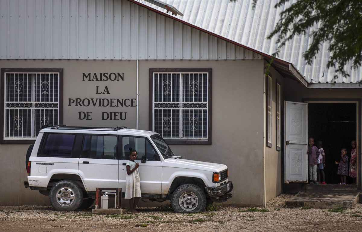 Children stand in the courtyard of the Maison La Providence de Dieu orphanage it Ganthier, Croix-des-Bouquets, Haiti, Sunday, Oct. 17, 2021, where a gang abducted 17 missionaries from a U.S.-based org ...