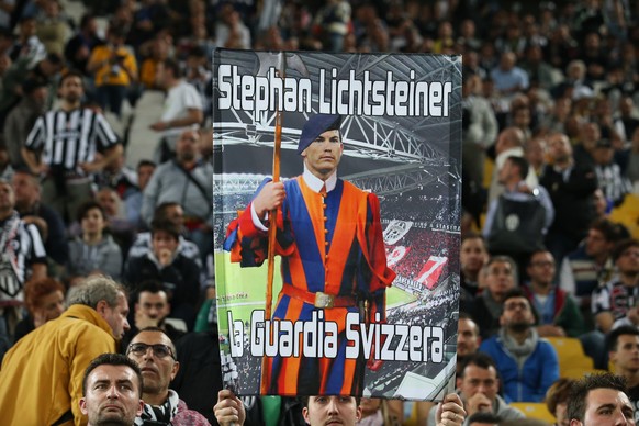 Football - Juventus v AS Monaco - UEFA Champions League Quarter Final First Leg - Juventus Stadium, Turin - Italy - 14/4/15
Fans hold up a banner for Juventus&#039; Stephan Lichtsteiner before the ga ...